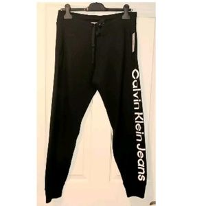 CALVIN KLEIN JEANS SIDE LOGO DRAWSTRING SWEATPANTS